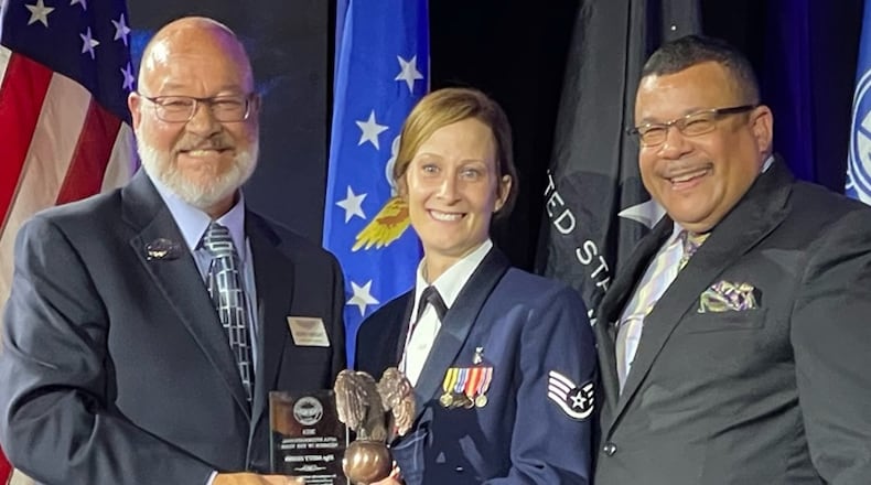 Air Force Sergeants Association International President Kerry Wright (left) and Executive Director Keith Reed present the 2021 AFSA International Member of the Year Award to Staff Sgt. Misty Hobbs on Aug. 9 in Las Vegas. CONTRIBUTED PHOTO/RUBEN GARCIA