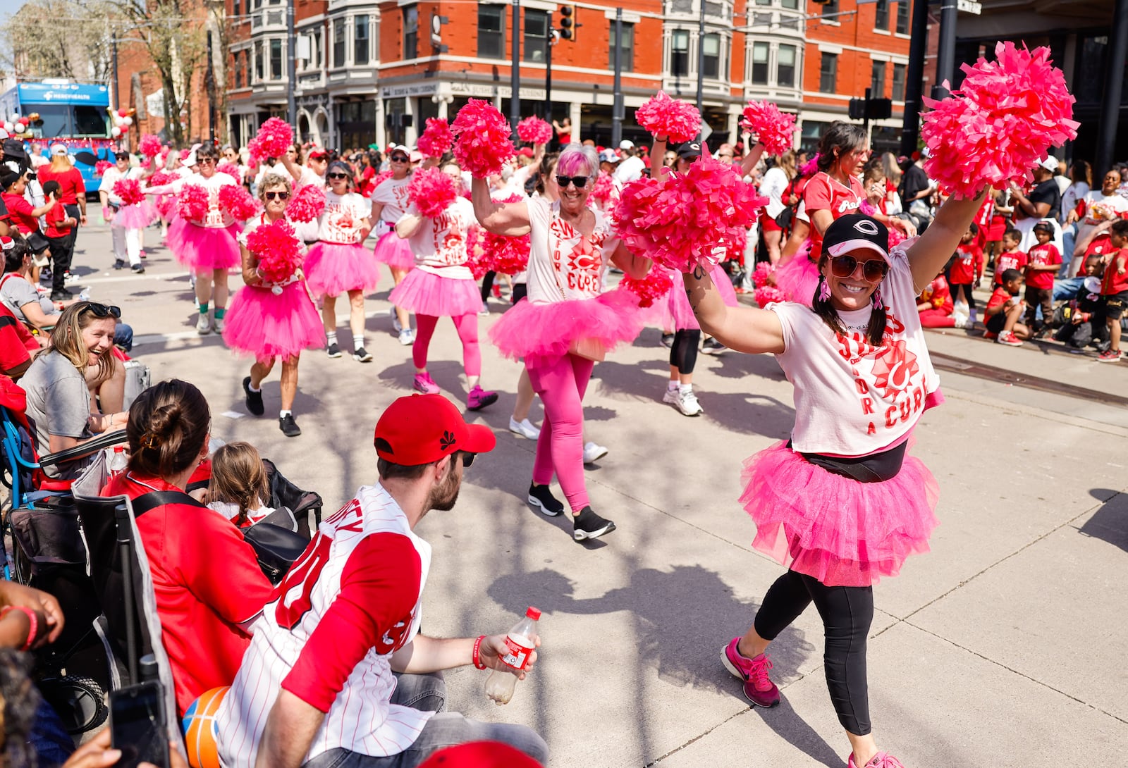 Cincinnati Reds Fans watch the 107th Findlay Market Opening Day Parade Thursday, March 26, 2026 in Cincinnati. NICK GRAHAM/STAFF