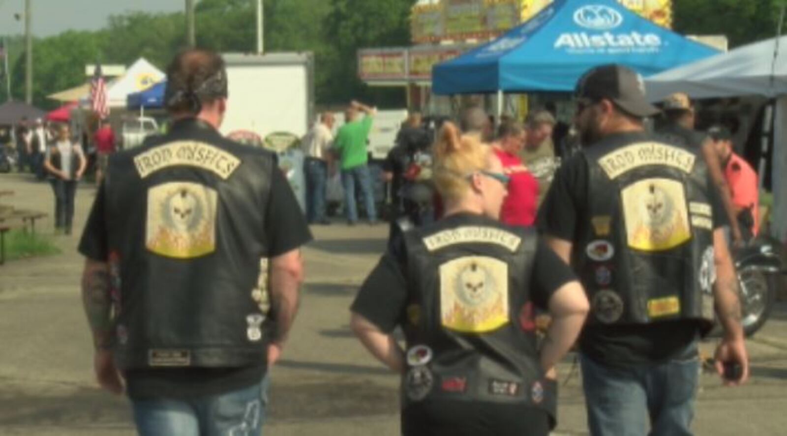Attendees walk around Kil-Kare Raceway in Xenia at the 18th annual Blessing of the Bikes.