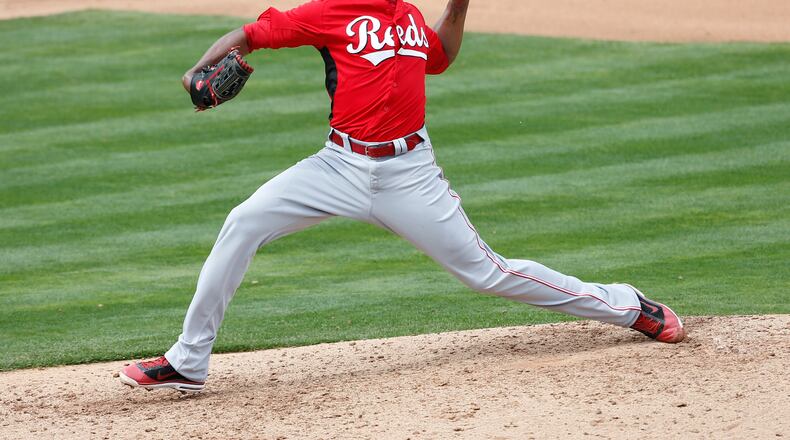 Cincinnati Reds pitcher Aroldis Chapman throws against the Los Angeles Angels during a spring training baseball game, Tuesday, March 5, 2013, in Tempe, Ariz. (AP Photo/Matt York)