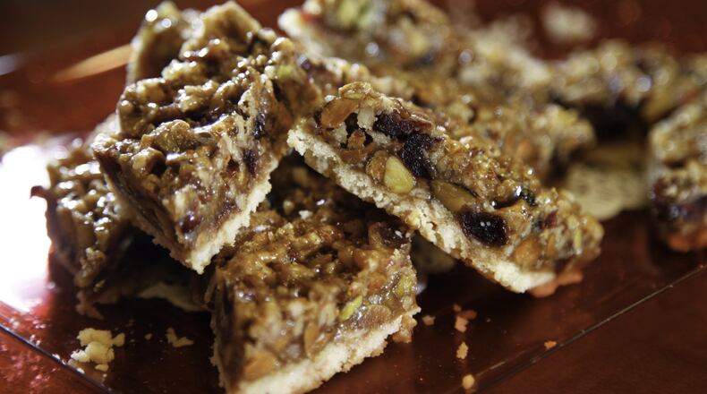 These delicious pecan bars submitted by Susette Kruckeberg of Versailles earned top prize in the Dayton Daily News 2012 Holiday Cookie Contest. STAFF/LISA POWELL