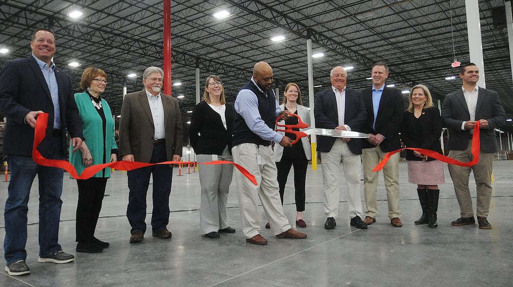 Legrand officials and well-wishers celebrate the opening on the its Union distribution center on Feb. 23, 2023. FILE