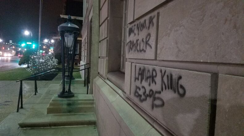 Police are investigating an act of vandalism that occurred Tuesday at the Hamilton Masonic Lodge on High Street. CONTRIBUTED/MICHAEL GRAHAM