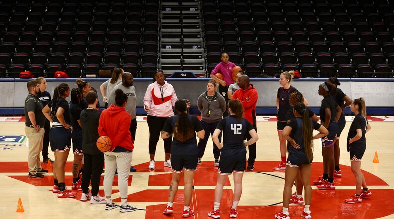 Dayton's Tamika Williams-Jeter talks to the team at practice on Tuesday, Oct. 4, 2022, at UD Arena. David Jablonski/Staff
