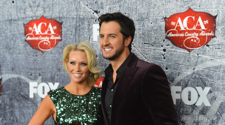LAS VEGAS, NV - DECEMBER 10:  Singer Luke Bryan (R) and his wife Caroline Boyer arrive at the 2012 American Country Awards at the Mandalay Bay Events Center on December 10, 2012 in Las Vegas, Nevada.  (Photo by Frazer Harrison/Getty Images)