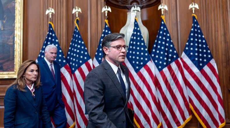 Speaker of the House Mike Johnson, R-La., center, joined from left by Rep. Lisa McClain, R-Mich., chair of the House Republican Conference, and House Majority Whip Tom Emmer, R-Minn., wrap up a news conference on day 23 of the government shutdown, at the Capitol in Washington, Thursday, Oct. 23, 2025. (AP Photo/J. Scott Applewhite)