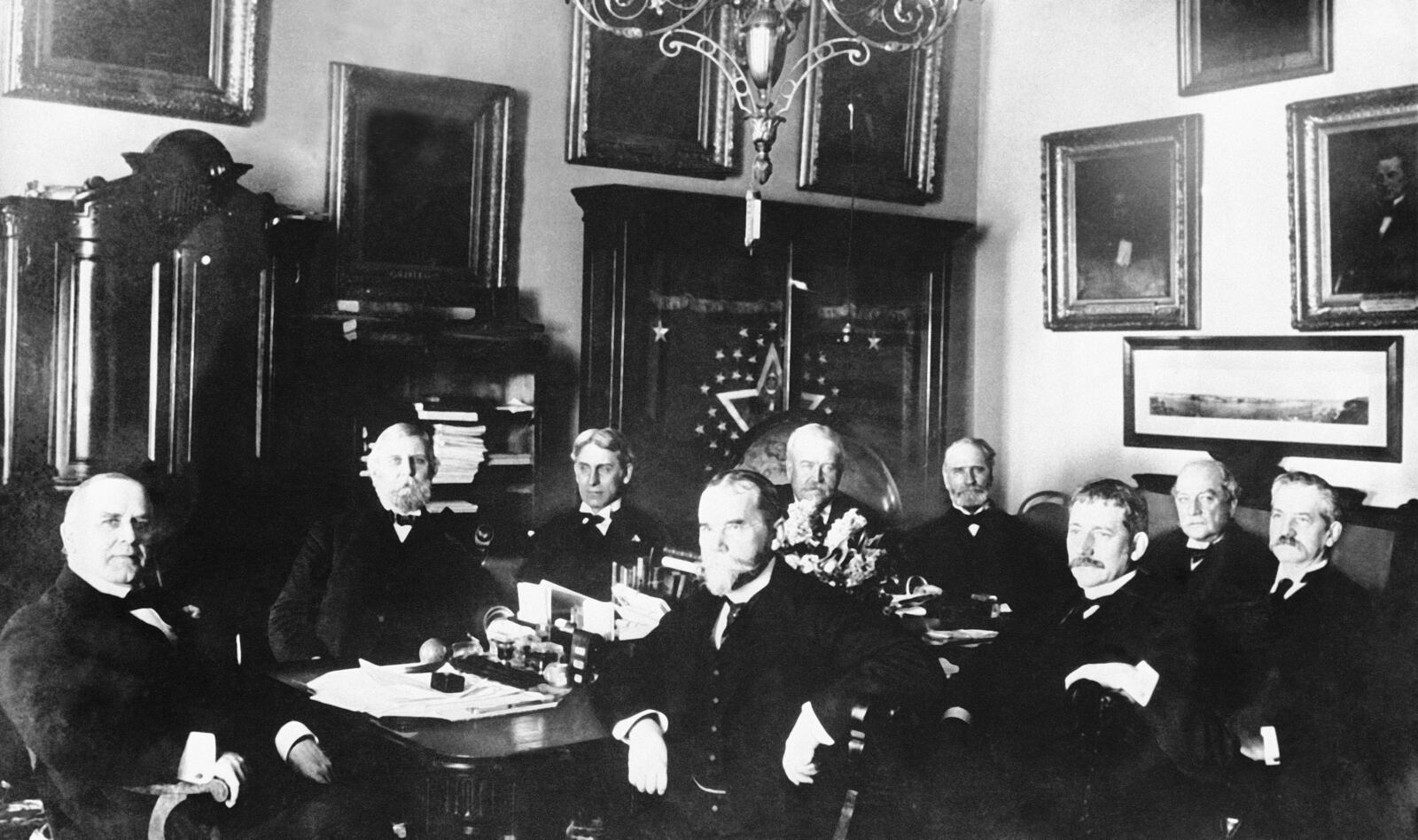 FILE - President William Mckinley, left, sits with his cabinet during a meeting in the White House in this photo dated 1898. (AP Photo, File)