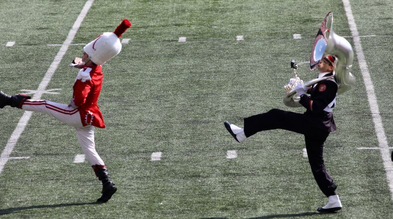 Ben Murawski of the Ohio State University Marching Band dots the 'i' in Script Ohio on Saturday, Oct. 9, 2021, in Columbus. Photo courtesy BuckeyeScoop.com