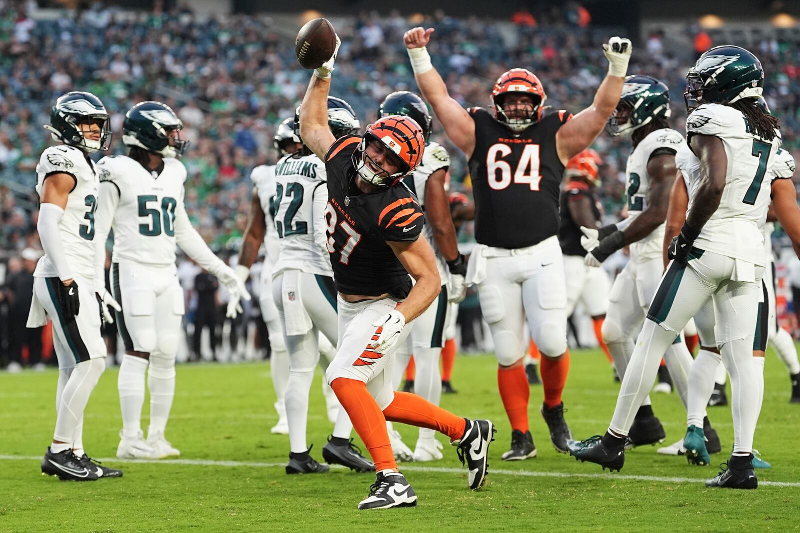Cincinnati Bengals tight end Tanner Hudson (87) celebrates his touchdown during the first half of an NFL preseason football game against the Philadelphia Eagles on Thursday, Aug. 7, 2025, in Philadelphia. (AP Photo/Matt Rourke)