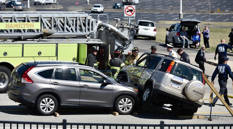 A wreck this afternoon involving two vehicles in the 1300 block of Main Street in Hamilton caused a temporary entrapment issue, but police did not believe there were injuries. NICK GRAHAM/STAFF
