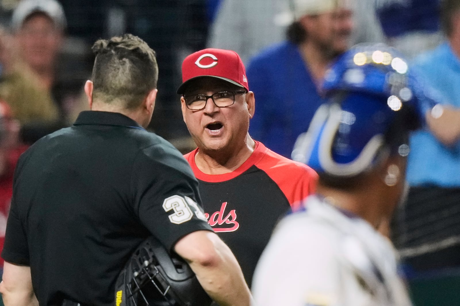Cincinnati Reds manager Terry Francona argues with home plate umpire Carlos Torres before getting ejected during the ninth inning of a baseball game against the Kansas City Royals, Wednesday, May 28, 2025, in Kansas City, Mo. (AP Photo/Charlie Riedel)