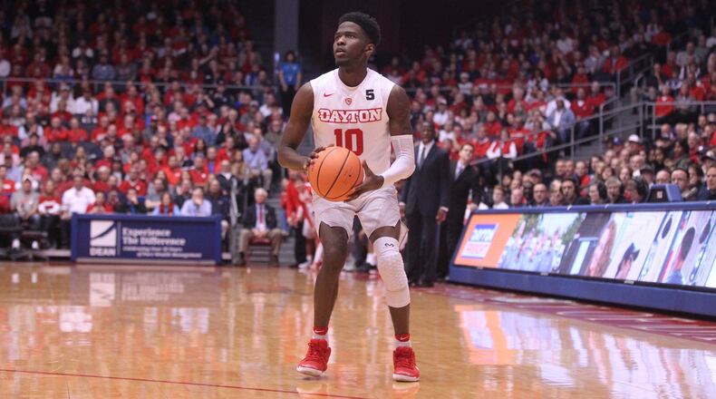Dayton’s Jalen Crutcher shoots against Auburn on Nov. 29, 2017, at UD Arena. David Jablonski/Staff