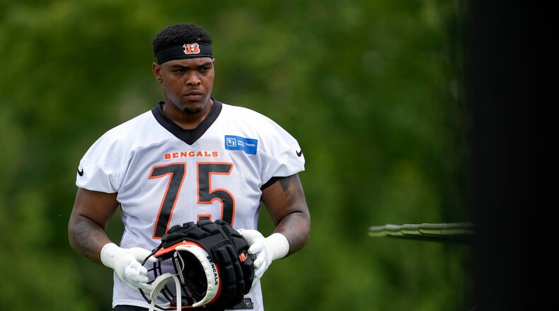 Cincinnati Bengals offensive tackle Orlando Brown Jr. walks onto the field during the NFL football team's training camp, Wednesday, July 26, 2023, in Cincinnati. (AP Photo/Jeff Dean)