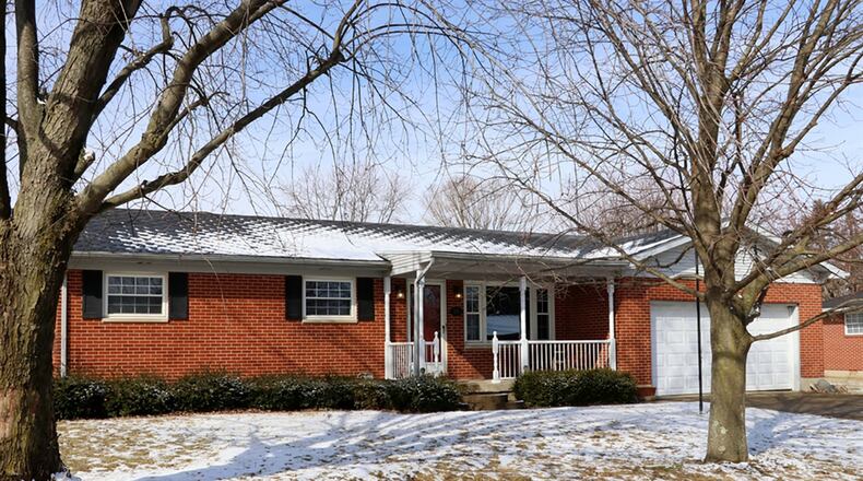 Renovations to this 4-bedroom home included a living space redesign, allowing for a new main bedroom with private bathroom and walk-in closet. Other renovations include the kitchen, flooring, electrical system, and heating and cooling systems. CONTRIBUTED PHOTOS BY KATHY TYLER