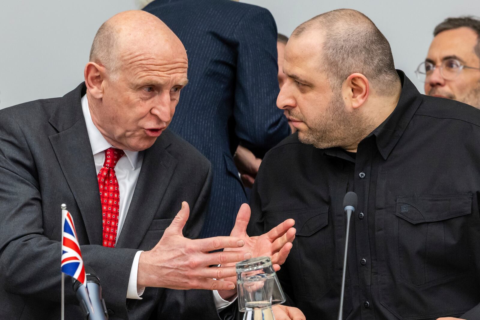 Britain's Defense Secretary John Healey, left, talks with Ukraine's Defense Minister Rustem Umerov during a meeting of the Ukraine Defence Contact Group at NATO headquarters in Brussels, Friday, April 11, 2025. (AP Photo/Geert Vanden Wijngaert)