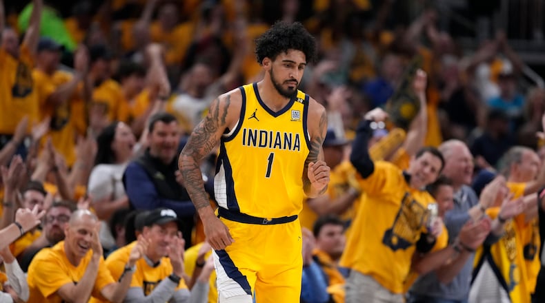 Indiana Pacers forward Obi Toppin (1) celebrates after making a basket during the first half of Game 4 of the NBA Eastern Conference basketball finals against the Boston Celtics, Monday, May 27, 2024, in Indianapolis. (AP Photo/Michael Conroy)