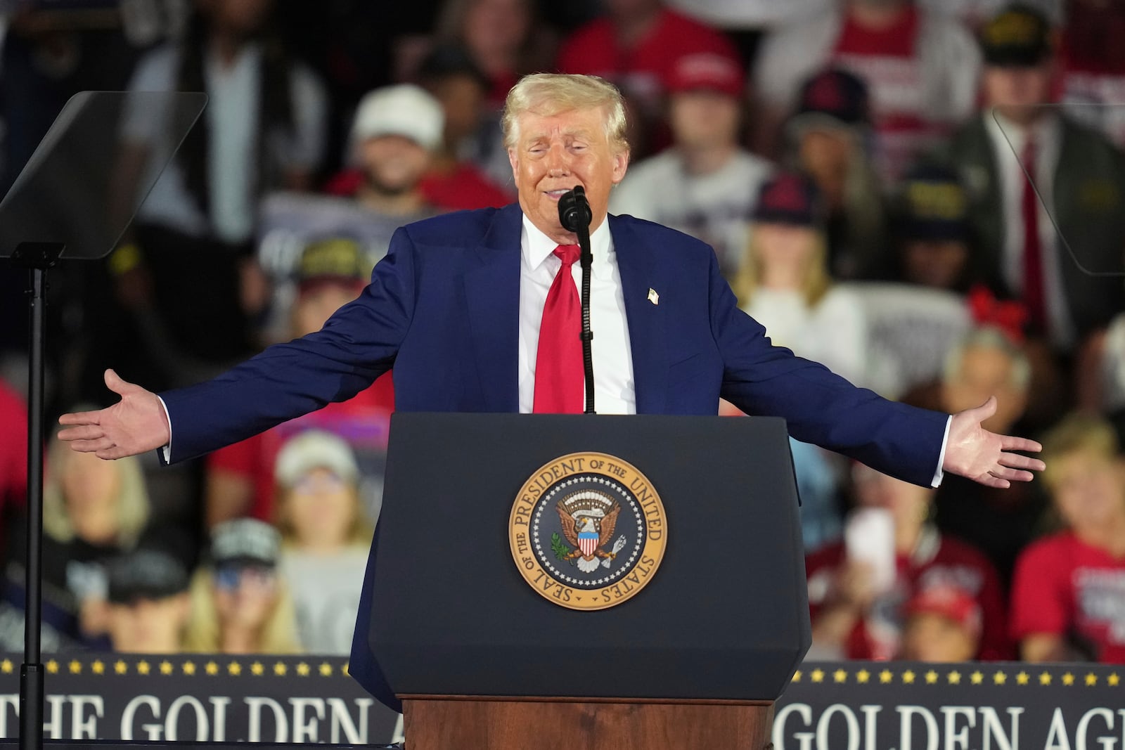 President Donald Trump speaks on his first 100 days at Macomb County Community College Sports Expo Center, Tuesday, April 29, 2025, in Warren, Mich. (AP Photo/Paul Sancya)