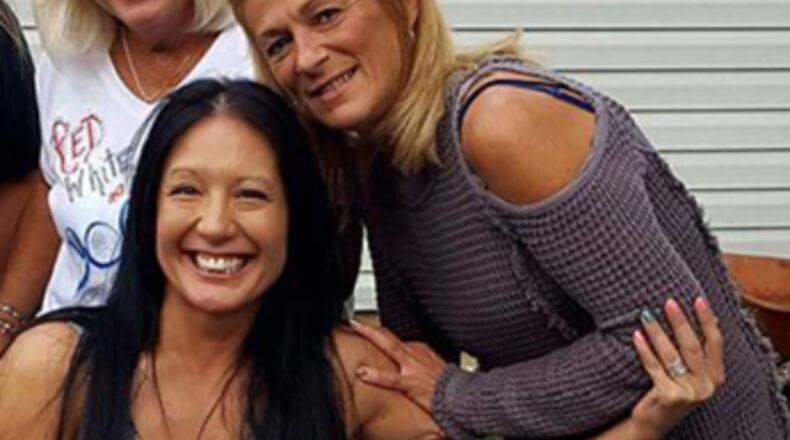 Marlina Medrano (left) in a photo courtesy of the Newark Advocate.