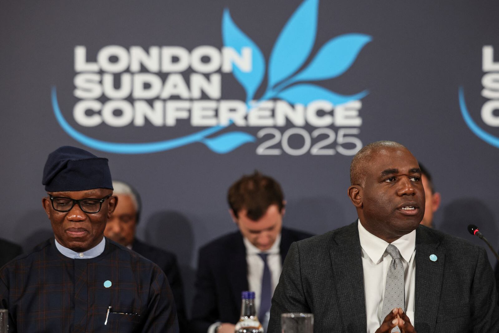 Bankole Adeoye, Political Affairs, Peace and Security Commissioner for the African Union, left, and Britain's Foreign Secretary David Lammy attend the London Sudan conference at Lancaster House in London, Tuesday, April 15, 2025. (Isabel Infantes/Pool Photo via AP)