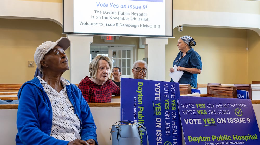 Volunteers in support of the passage of Issue 9 listen during a meeting on Tuesday, Sept. 23 at College Hill Community Church on Philadelphia Drive in western Dayton. If passed, the levy would raise $2 million in support of a new public hospital in West Dayton. BRYANT BILLING / STAFF