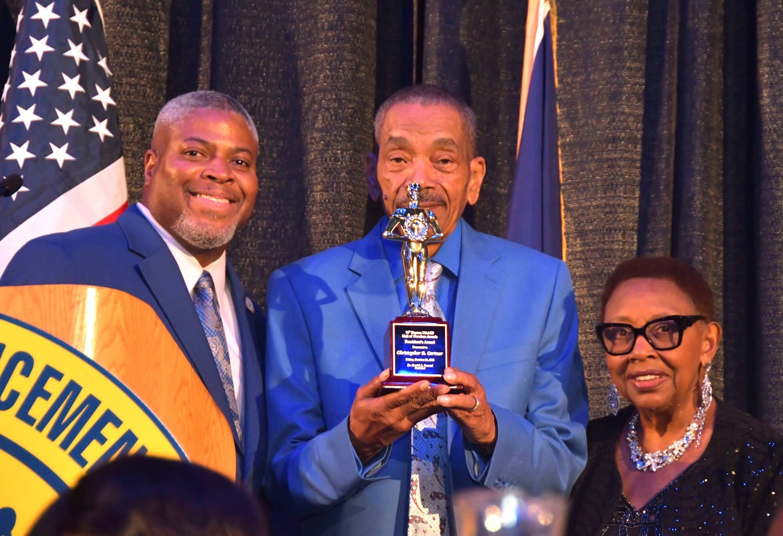 Christopher R. Cortner received the President's Award presented by Dr. Derrick L. Foward, president of the Dayton Branch NAACP.