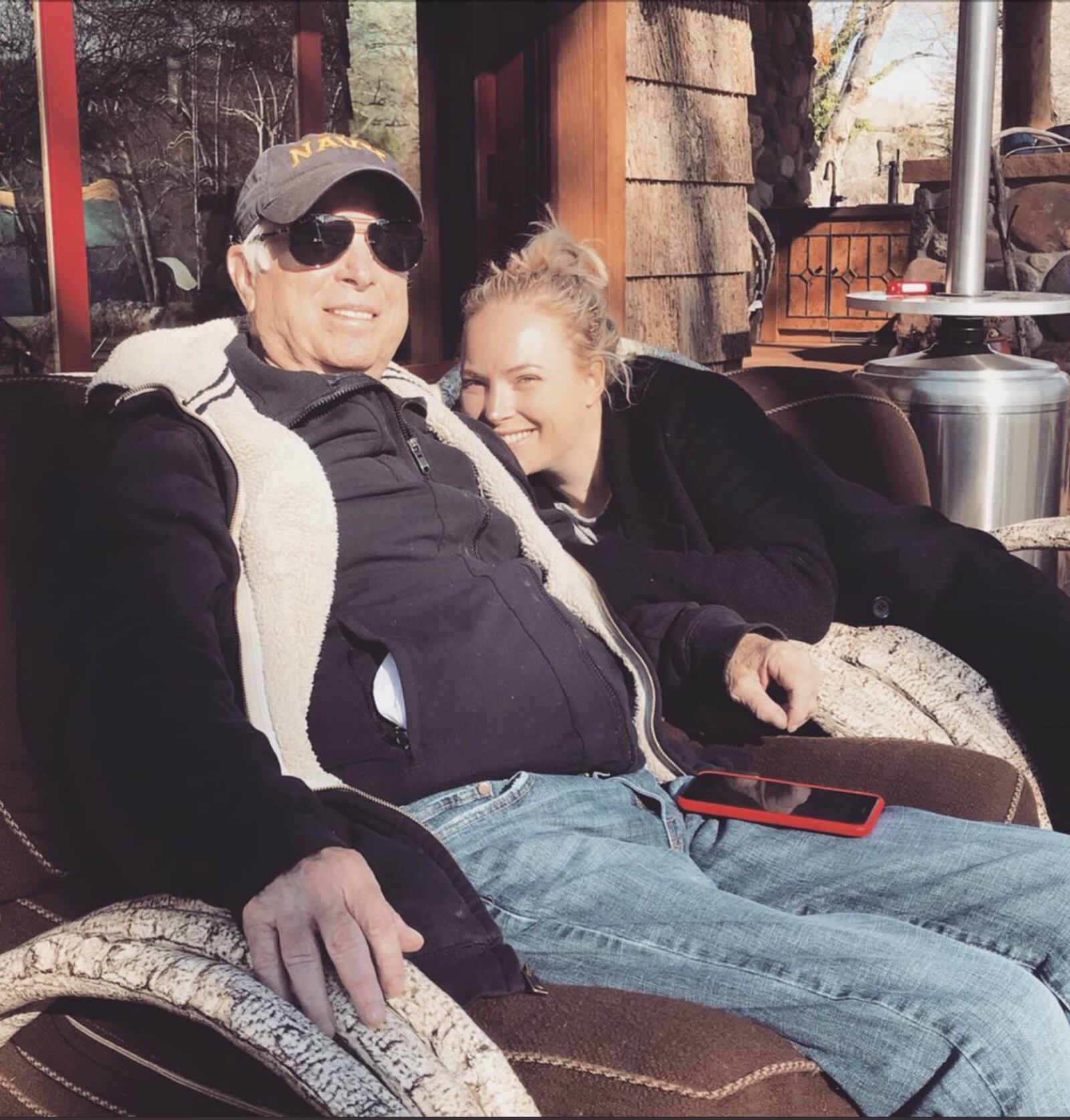 U.S. Sen. John McCain and his daughter Meghan relax outside the family's cabin near Sedona in February.