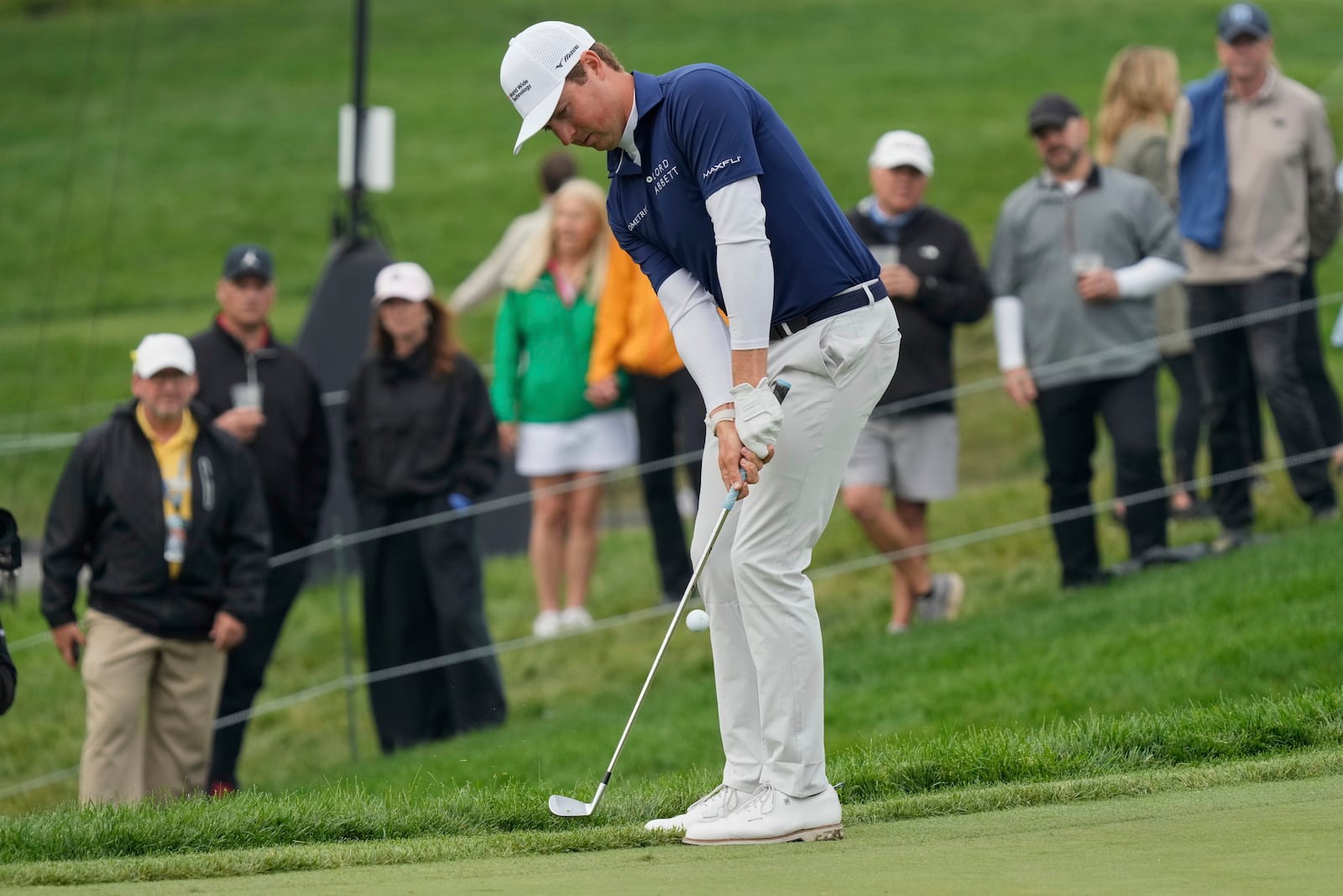 Ben Griffin hits onto the 18th green during the second round of the Memorial golf tournament Friday, May 30, 2025, in Dublin, Ohio. (AP Photo/Sue Ogrocki)