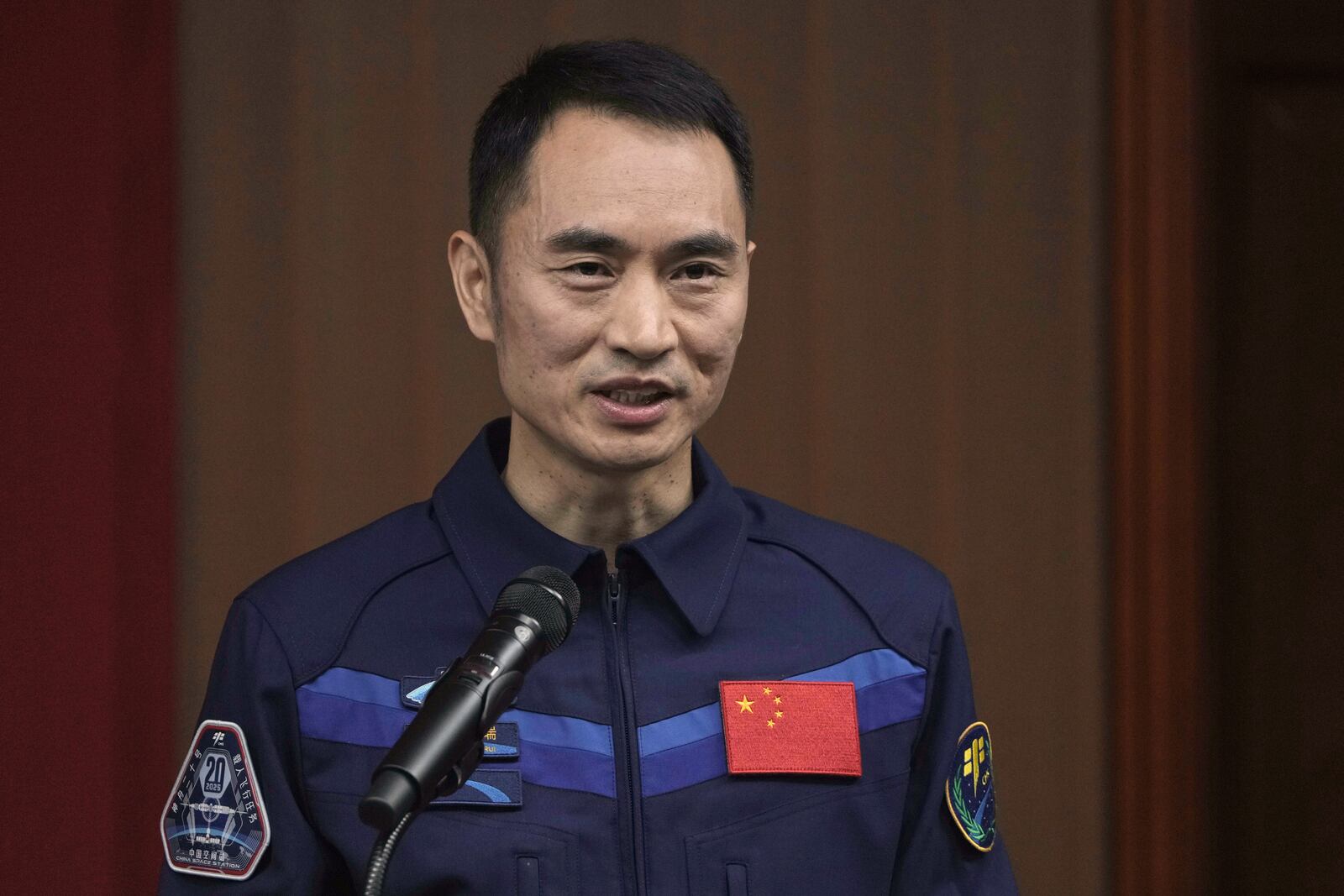 Chinese astronaut for the upcoming Shenzhou 20 mission Chen Zhongrui speaks during a meeting with media members at the Jiuquan Satellite Launch Center in northwest China, Wednesday, April 23, 2025. (AP Photo/Andy Wong)