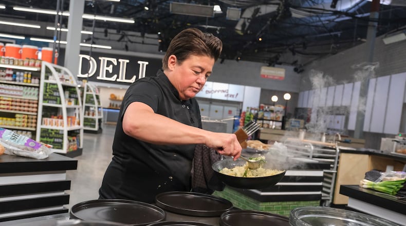 Chef Dana Downs cooking on Food Network's "Guy's Grocery Games" PHOTO COURTESY OF FOOD NETWORK.