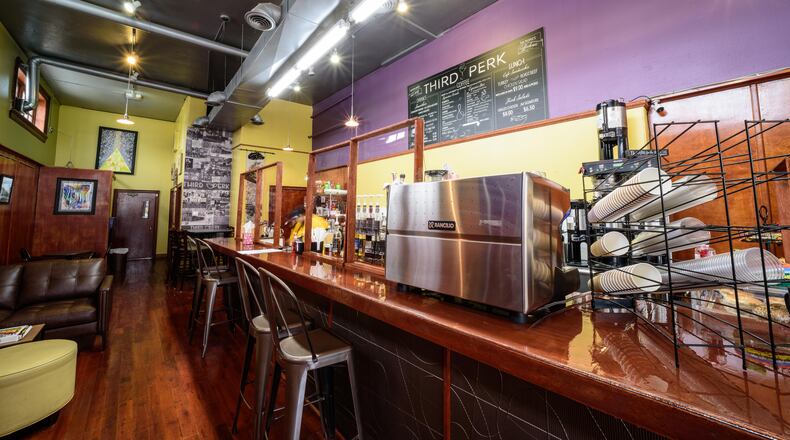 Step inside the new Third Perk Coffeehouse & Wine Bar, located at 146 E. Third St. in downtown Dayton’s Fire Blocks District. This location opened on December 30, 2020. Third Perk’s original location opened in 2016 at 46 W. Fifth St. Owner Juanita Darden decided to close the coffee shop February 20, 2020 for carpal-tunnel surgery but also had the desire to start fresh with a change of scenery. In addition to the downtown coffee shop, Darden operates Third Perk Express at the Dayton Mall. TOM GILLIAM / CONTRIBUTING PHOTOGRAPHER