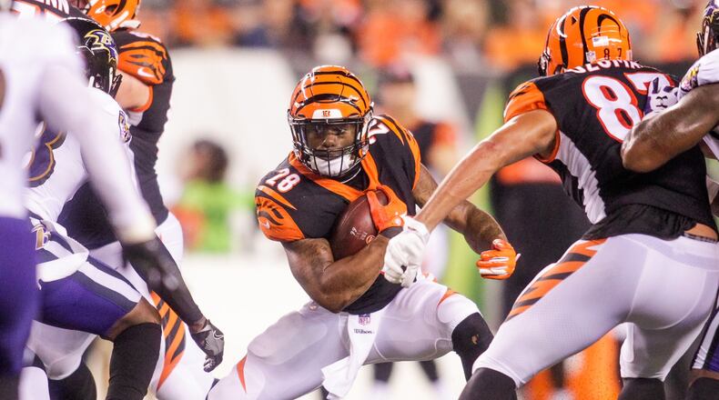 Cincinnati Bengals running back Joe Mixon carries the ball during their game against the Baltimore Ravens Thursday, Sept. 13 at Paul Brown Stadium in Cincinnati. The Cincinnati Bengals defeated the Baltimore Ravens 34-23. NICK GRAHAM/STAFF