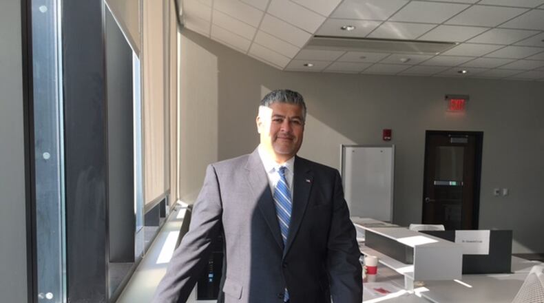 Hernan Olivas, president and chief executive of O’Neil & Associates Inc., who will help preside over his company’s business and education center that will open at Wright State University Sept. 19. THOMAS GNAU/STAFF