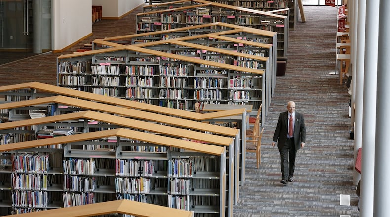 The new downtown Main Library opened Aug. 5. Tim Kambitsch, the executive director of the Dayton Metro Library (pictured), will be retiring on Feb. 28. LISA POWELL / STAFF