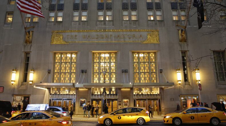 In this Feb. 28, 2017 file photo, taxis pull up in front of the renowned Waldorf Astoria hotel in New York. The word "grand" matched few hotels in the world better than the Waldorf, but this bastion of gilded splendor is now closing for two to three years for a transformative makeover. The last guests were checking out by noon Wednesday March 1, 2017, after enjoying the rich Art Deco style of the old Waldorf one last time. (AP Photo/Kathy Willens, File)