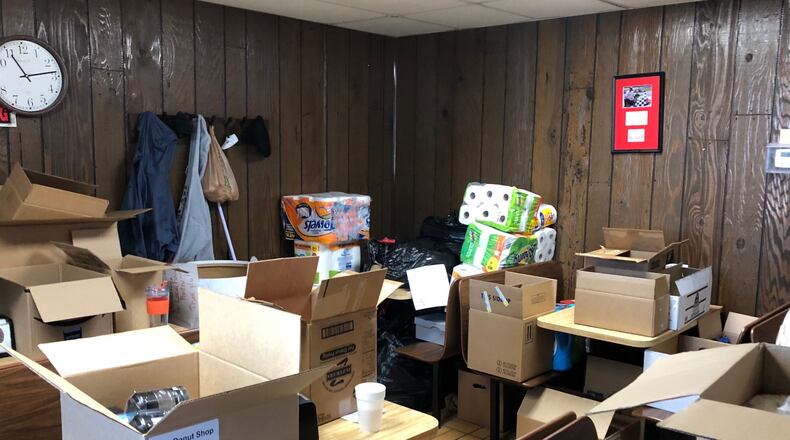 The side room at Bill's  Donuts in Centerville is starting to fill up with donated items to be taken to Florida for hurricane relief. MARK FISHER/STAFF