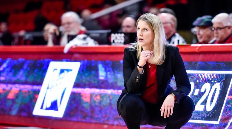 Miami women’s basketball coach Megan Duffy cheers on her team against Duquense on Thursday, March 15, 2018, at Millett Hall in Oxford. NICK GRAHAM/STAFF