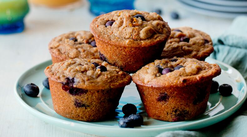 Whole-grain blueberry muffins with orange streusel in New York, Feb. 13, 2016. Muffins can be a perfect compromise between healthy and delicious, especially if you make them yourself.
