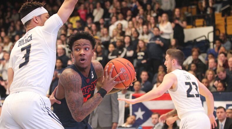Dayton’s John Crosby looks for a shot against George Washington in the first half on Saturday, March 4, 2017, at the Smith Center in Washington, D.C. David Jablonski/Staff
