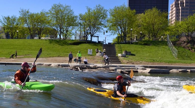 Paddlers at RiverScape in downtown Dayton. CONTRIBUTED