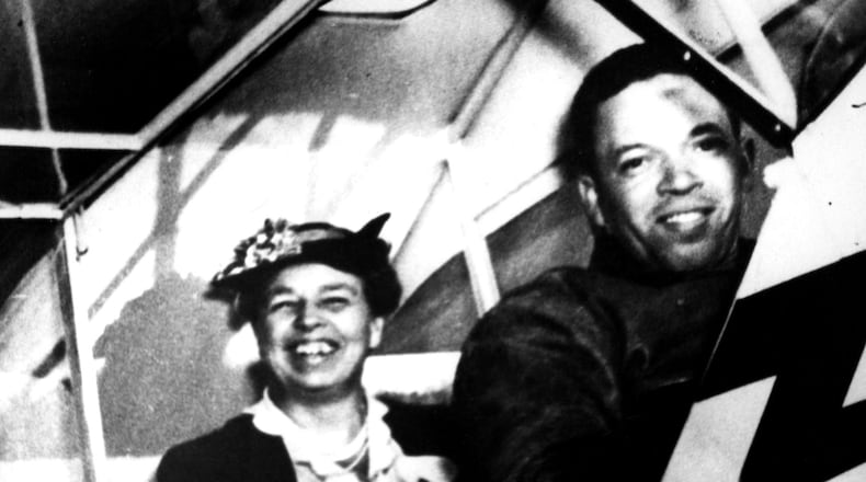 First Lady Eleanor Roosevelt supported the Civilian Pilot Training Program and the War Training Service. She is pictured here in a Piper J-3 Cub trainer with C. Alfred Chief Anderson, a pioneer black aviator and respected instructor at Tuskegee Institute. (U.S. Air Force photo)