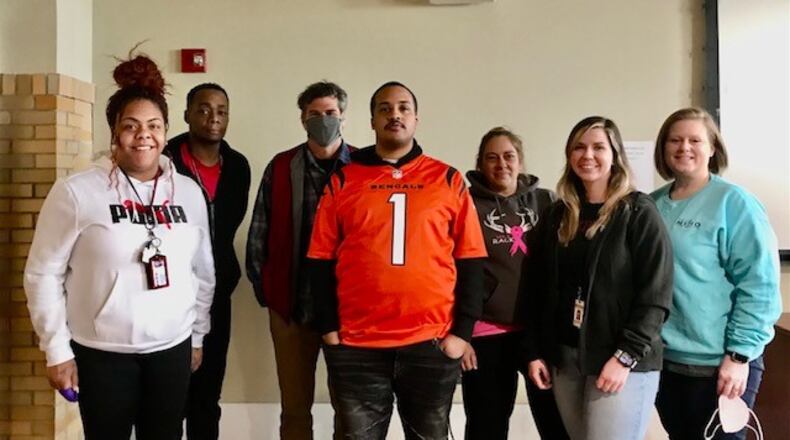 The Miami Valley Housing Opportunities homeless outreach team includes (L-R) Sierra Hicks, Terrance Smith, Andy Altenburg, Kimo Scott, Amy Muran, Olivia Albertson and Program Services Director Heather Wilson. The team helps provide services to people living on the streets. CONTRIBUTED
