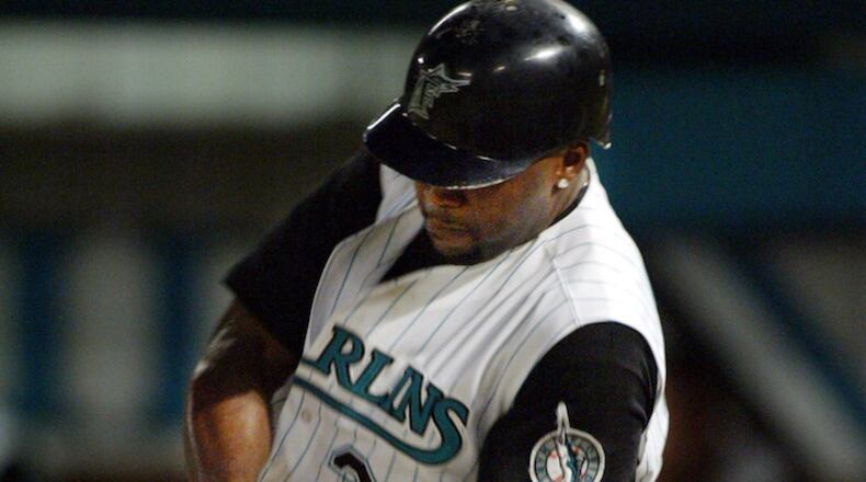 Cliff Floyd (30), a member of what was then the Florida Marlins, hits a pop fly during the fifth inning against the Detroit Tigers on Saturday, June 22, 2002 at Pro Player Stadium. (Richard Patterson/Miami Herald/TNS)