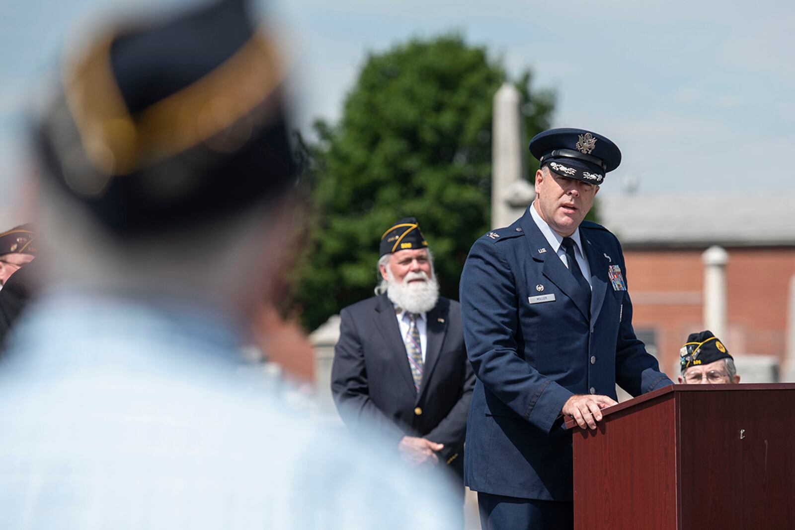 Col. Patrick Miller, 88th Air Base Wing and installation commander, delivers remarks as the keynote speaker during a Memorial Day ceremony in Fairborn May 31. Established in 1971, Memorial Day is an official federal holiday meant to allow people to honor the men and women who have died while on duty with the U.S. military. U.S. AIR FORCE PHOTO/WESLEY FARNSWORTH