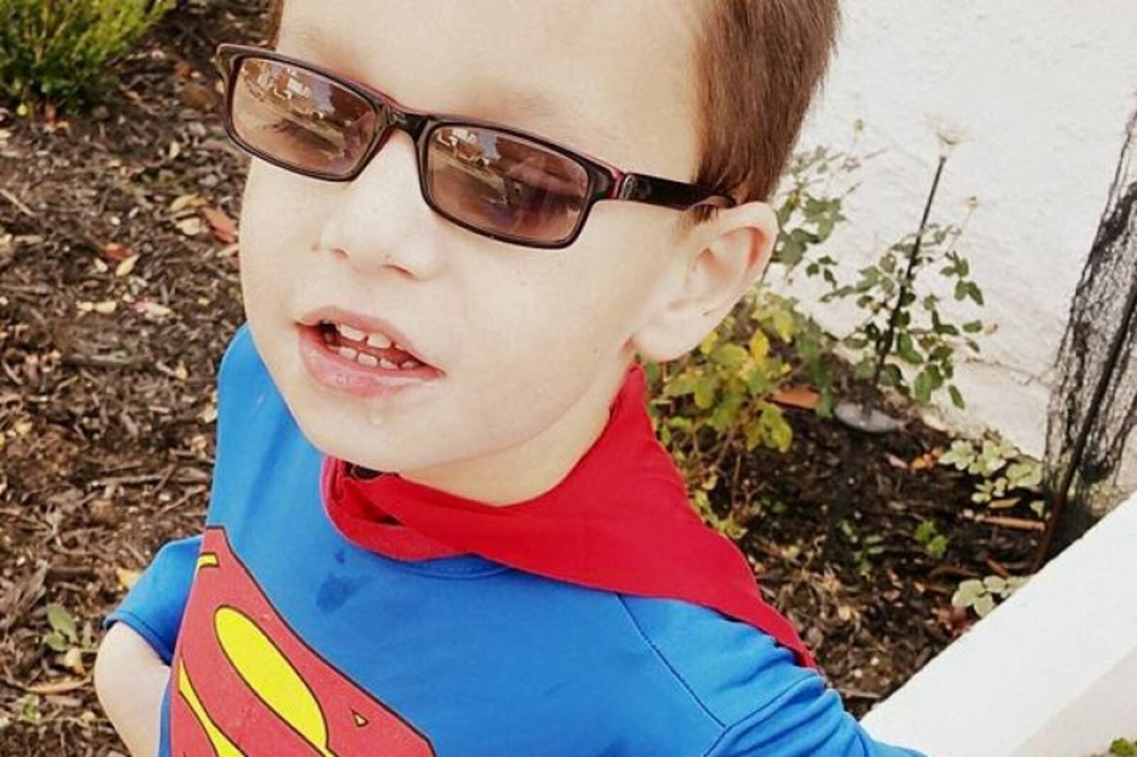 "Super Aiden" Myers of Versailles Ohio underwent brain surgery at Texas Children's Hospital in Houston the day Hurricane Harvey hit. Now flood waters are keeping them in Texas. CONTRIBUTED PHOTO: Danielle Myers