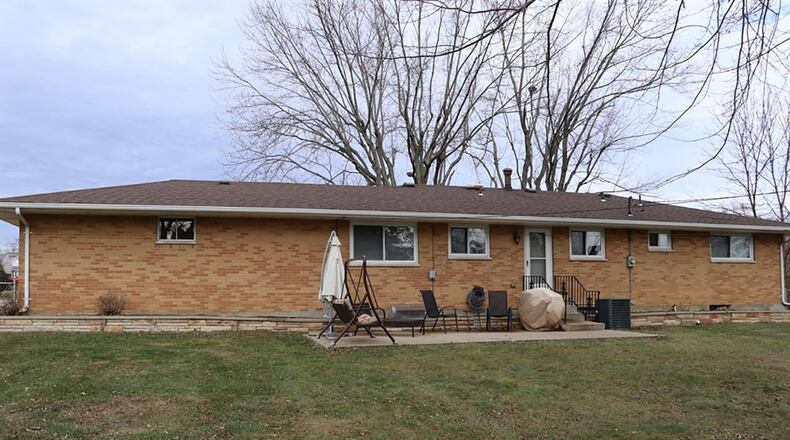 The house sits on about a half-acre lot on a dead-end street. The back yard is surrounded by a chain-link fence, and there are no rear neighbors.