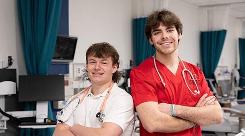 During student finals exam week in December two Miami University classmates were among those who rushed to help an adjunct professor who had suddenly collapsed outside of Mosler Hall on Miami’s Hamilton campus. It was an apparent heart attack and while other students tried to come to the man’s aid, Brayden Osborne (left) and Reed Stewart were uniquely prepared to save his life. CONTRIBUTED