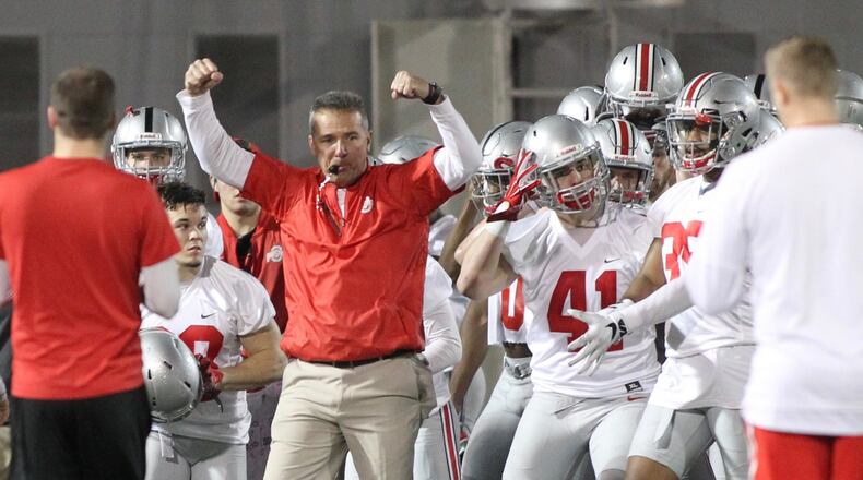 Ohio State coach Urban Meyer reacts as the Buckeyes break a huddle during spring practice on Tuesday, March 7, 2017, at the Woody Hayes Athletic Center in Columbus. David Jablonski/Staff