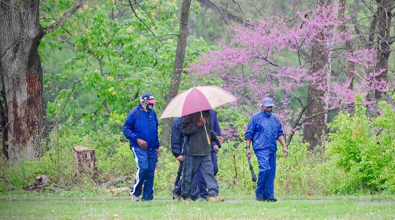 Here are a few people out walking and talking on this rainy Thursday, April 29, 2021 near the Wegerzyn Center.