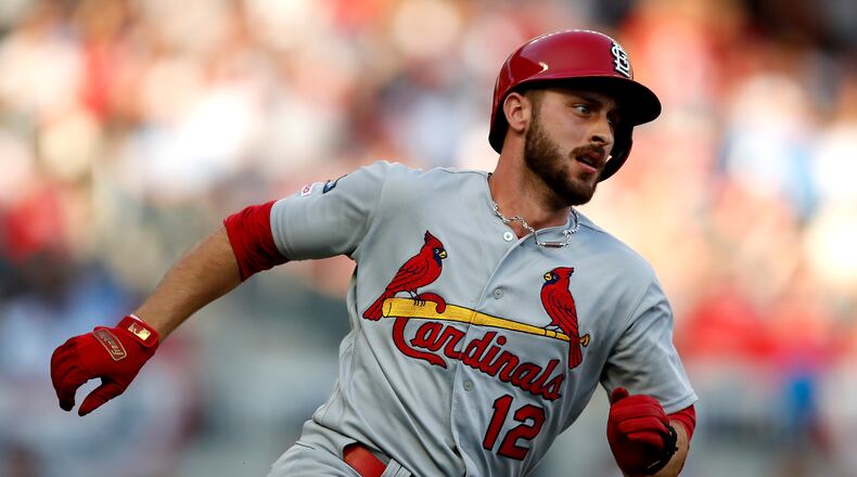 ATLANTA, GEORGIA - OCTOBER 09: Paul DeJong #12 of the St. Louis Cardinals rounds first base as he hits an RBI double against the Atlanta Braves during the second inning in game five of the National League Division Series at SunTrust Park on October 09, 2019 in Atlanta, Georgia. (Photo by Todd Kirkland/Getty Images)