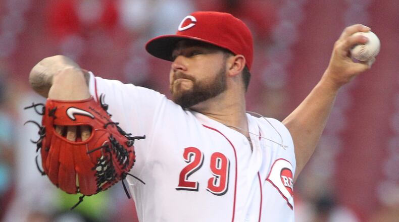 Reds starter Brandon Finnegan pitches against the Braves on Monday, July 18, 2016, at Great American Ball Park in Cincinnati. David Jablonski/Staff
